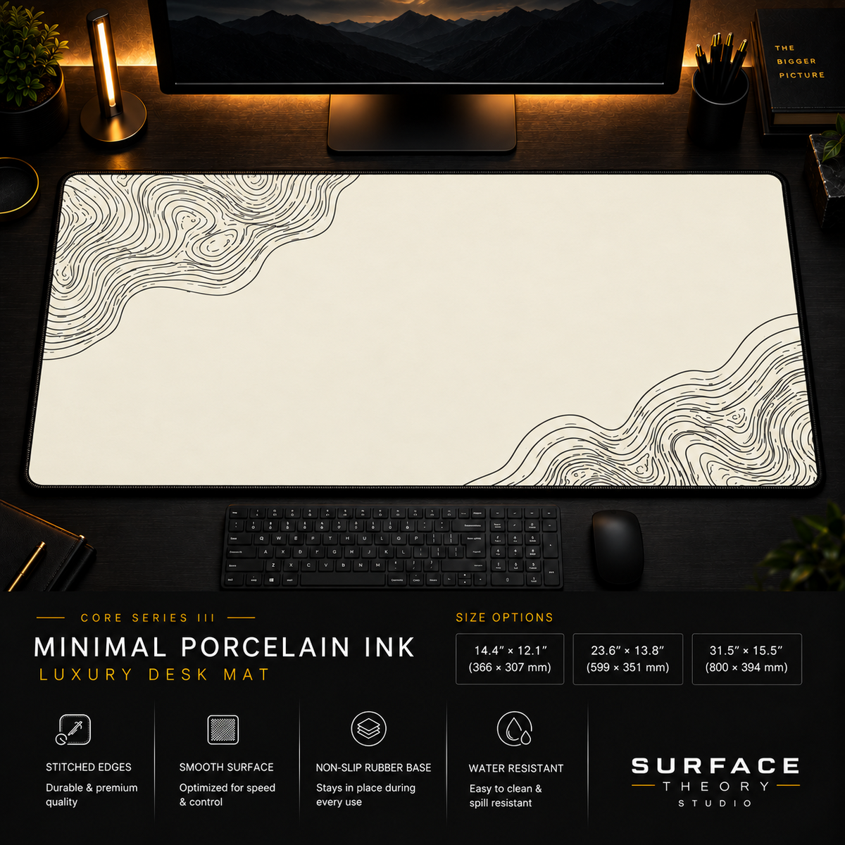 Minimal Porcelain Ink desk mat in a dark workstation with warm monitor lighting.
