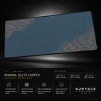 Minimal Slate Copper desk mat floating against a dark studio background.