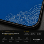 Close-up of Minimal Cobalt Pearl printed artwork and black stitched corner.