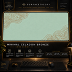 Minimal Celadon Bronze desk mat in a gold-toned showcase frame above a keyboard.