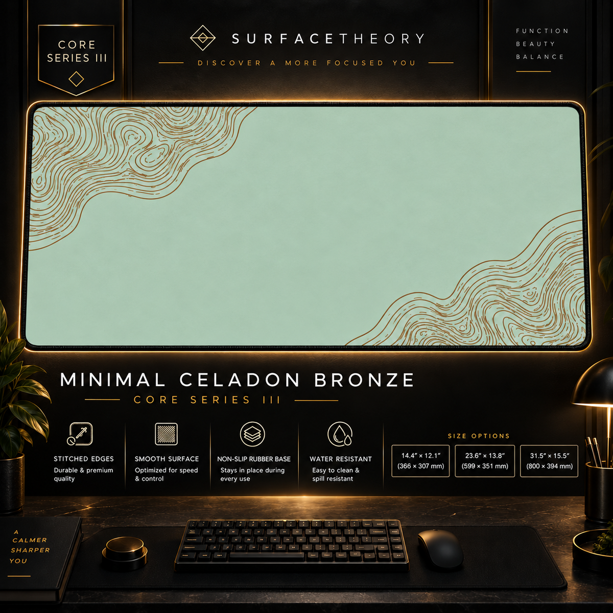Minimal Celadon Bronze desk mat in a gold-toned showcase frame above a keyboard.