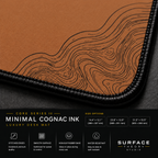 Close-up of Minimal Cognac Ink printed artwork and black stitched corner.