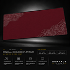 Minimal Oxblood Platinum desk mat floating against a dark studio background.