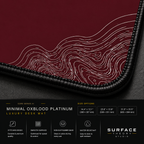 Close-up of Minimal Oxblood Platinum printed artwork and black stitched corner.