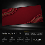 Burgundy Relief desk mat floating against a dark studio background.