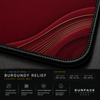 Close-up of Burgundy Relief printed artwork and black stitched corner.