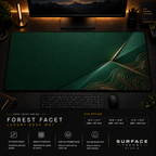 Forest Facet desk mat in a dark workstation with warm monitor lighting.