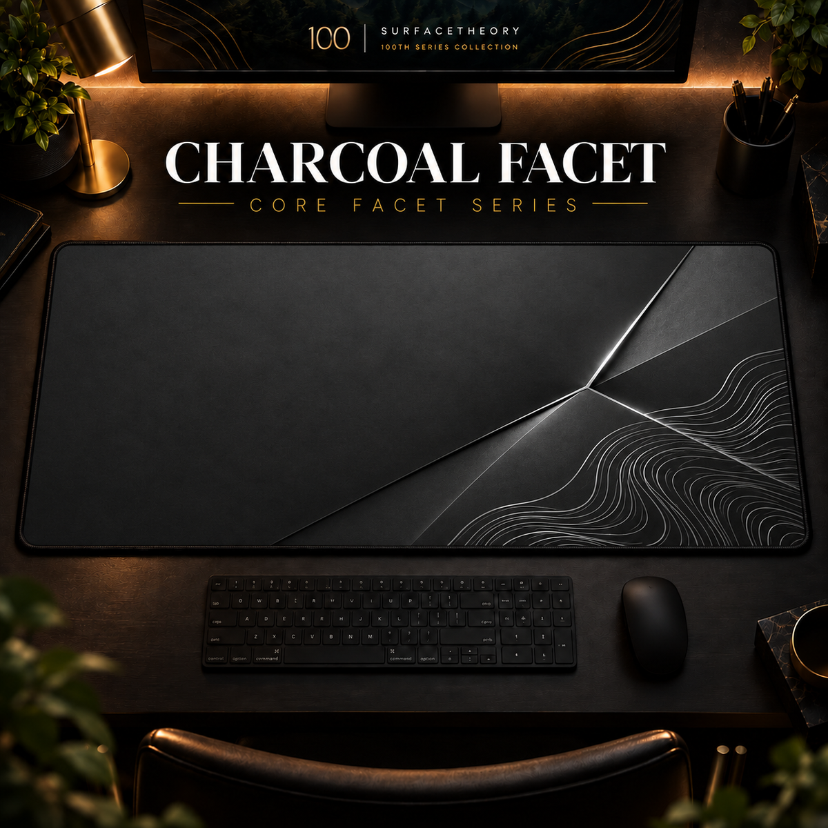 Charcoal Facet desk mat in a warm, dark workspace.