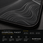 Close-up of Charcoal Facet printed artwork and black stitched corner.