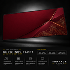 Burgundy Facet desk mat floating against a dark studio background.