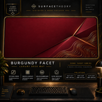 Burgundy Facet desk mat in a gold-toned showcase frame above a keyboard.