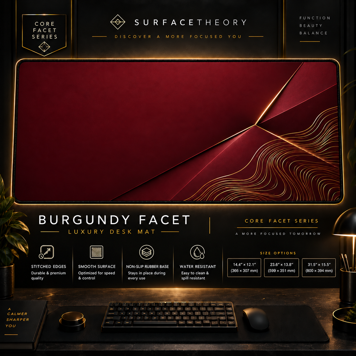 Burgundy Facet desk mat in a gold-toned showcase frame above a keyboard.