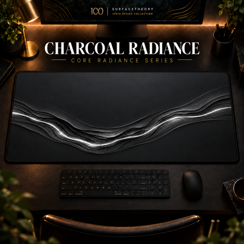 Charcoal Radiance desk mat in a warm, dark workspace.
