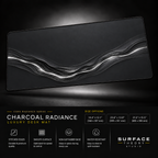 Charcoal Radiance desk mat floating against a dark studio background.