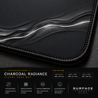 Close-up of Charcoal Radiance printed artwork and black stitched corner.