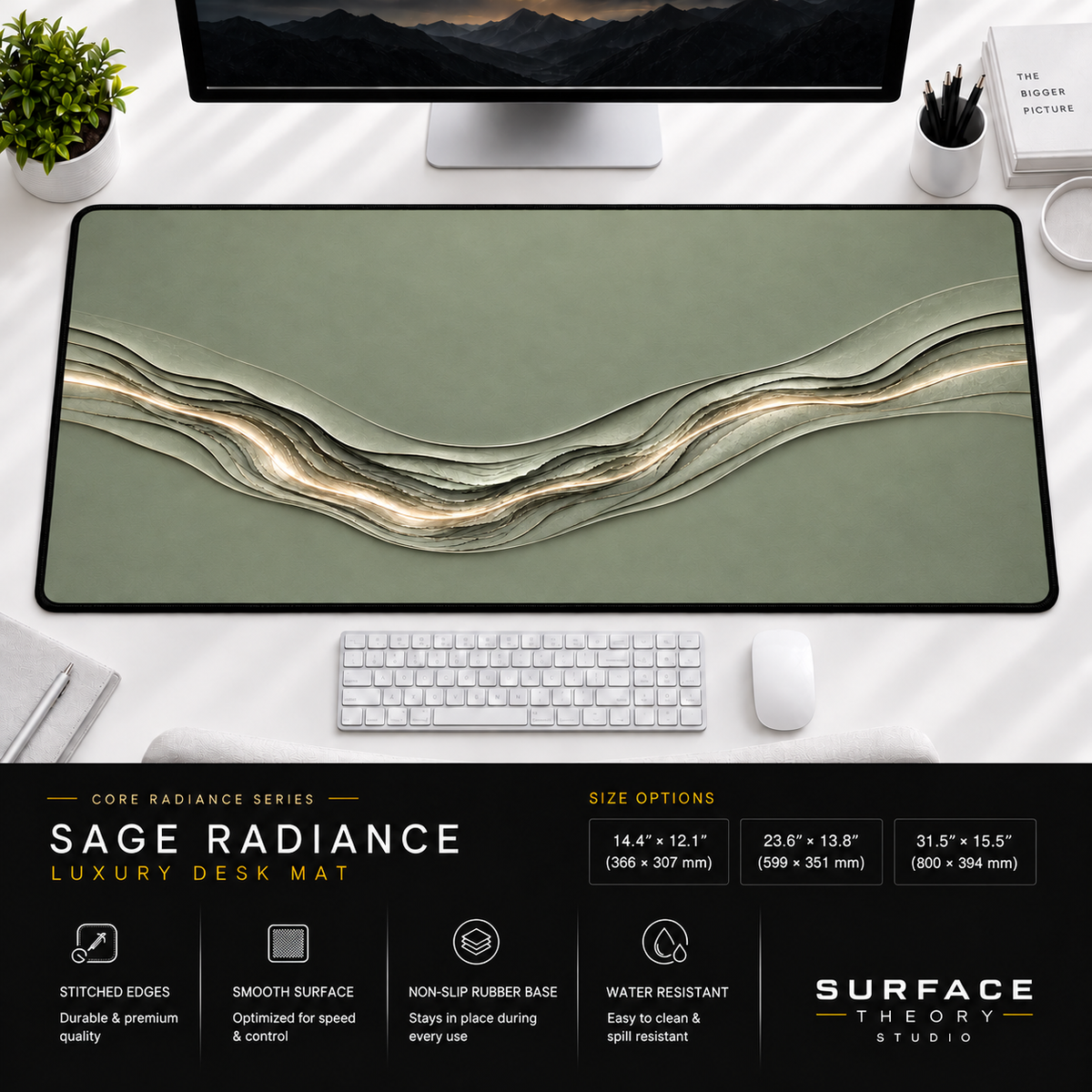 Sage Radiance desk mat beneath a monitor on a bright desk with a white keyboard and mouse.