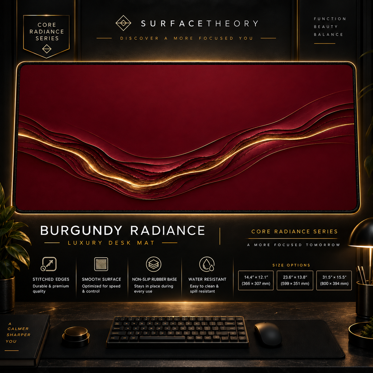 Burgundy Radiance desk mat in a gold-toned showcase frame above a keyboard.
