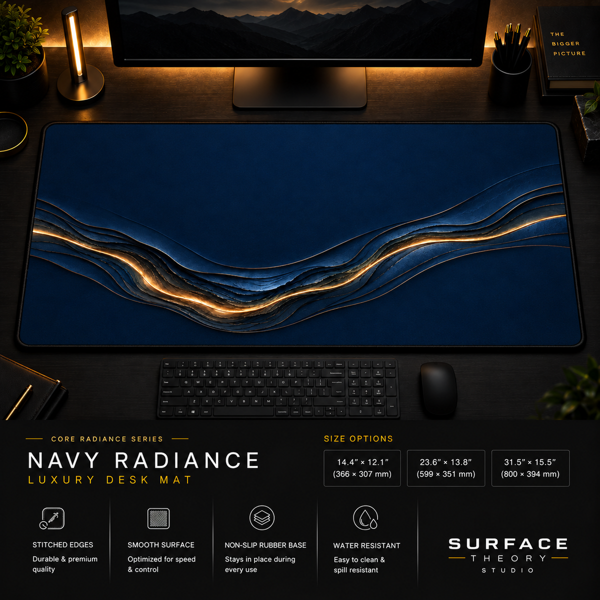 Navy Radiance desk mat in a dark workstation with warm monitor lighting.