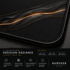Close-up of Obsidian Radiance printed artwork and black stitched corner.