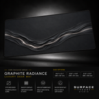 Graphite Radiance desk mat floating against a dark studio background.