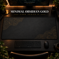 Minimal Obsidian Gold desk mat in a warm, dark workspace.