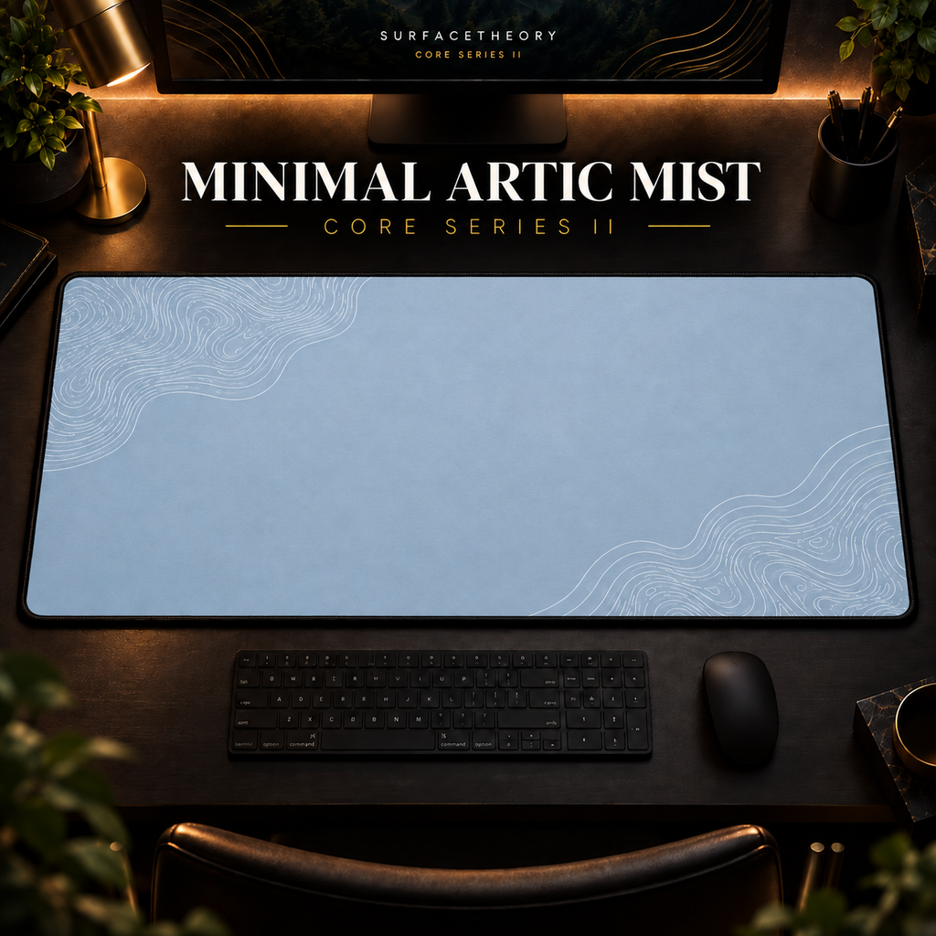 Minimal Artic Mist desk mat in a warm, dark workspace.
