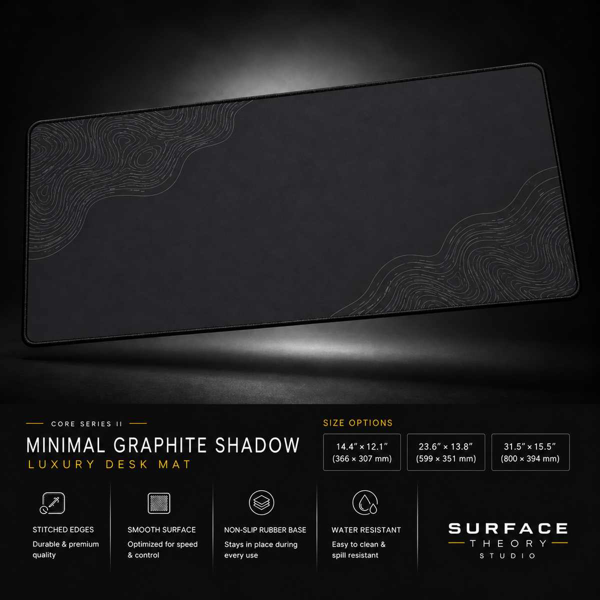 Minimal Graphite Shadow desk mat floating against a dark studio background.