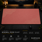 Minimal Rose Clay desk mat in a dark workstation with warm monitor lighting.