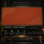 Minimal Terra Ember desk mat in a gold-toned showcase frame above a keyboard.