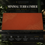 Minimal Terra Ember desk mat on a studio display with size and product information.