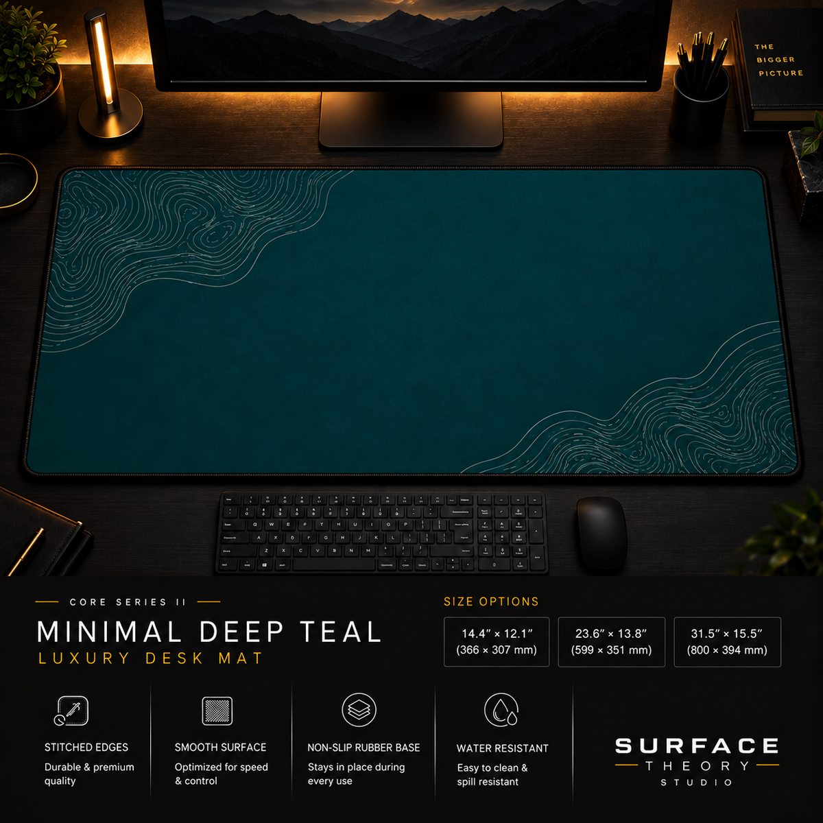 Minimal Deep Teal desk mat in a dark workstation with warm monitor lighting.