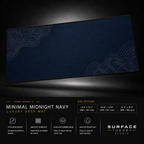 Minimal Midnight Navy desk mat floating against a dark studio background.