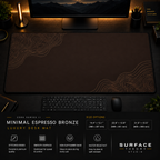 Minimal Espresso Bronze desk mat in a dark workstation with warm monitor lighting.