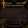 Minimal Espresso Bronze desk mat in a warm, dark workspace.