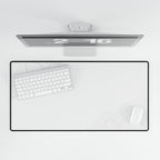 Overhead view of Minimal White desk mat beneath a keyboard and mouse on a white desk.