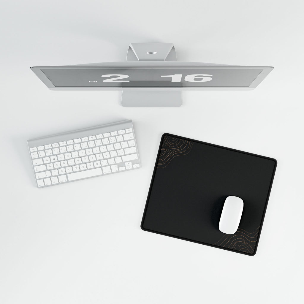 Overhead view of Minimal Black compact desk mat with a mouse beside the keyboard.