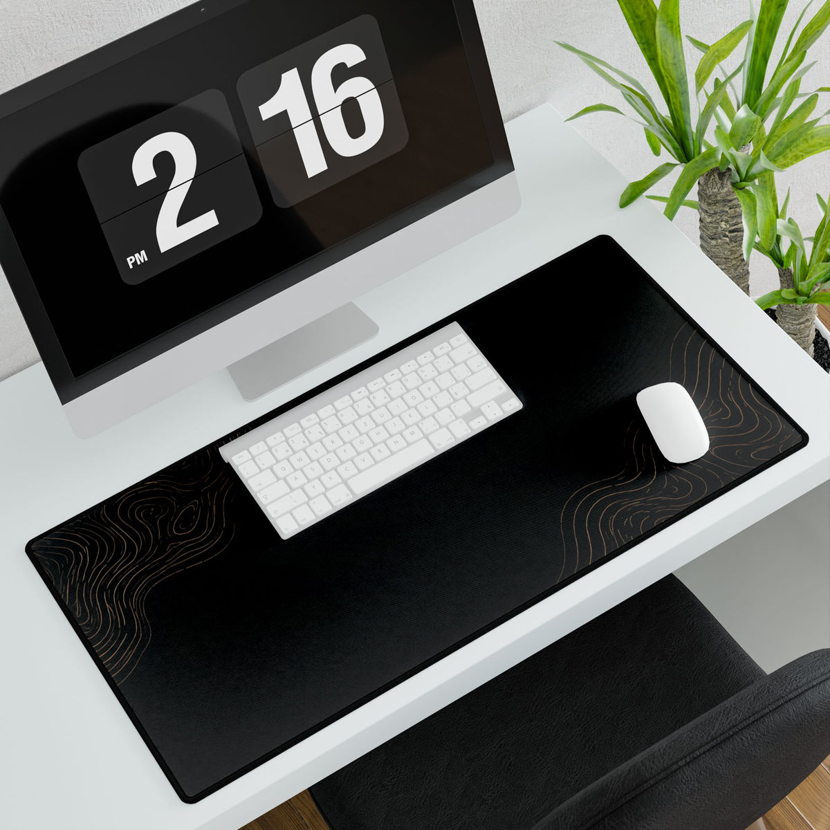 Minimal Black desk mat in a wide format, shown with a keyboard and mouse on a white desk.