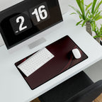 Printify preview: Burgundy Relief, 23.6 × 13.8 inches, angled desk view with keyboard and mouse.