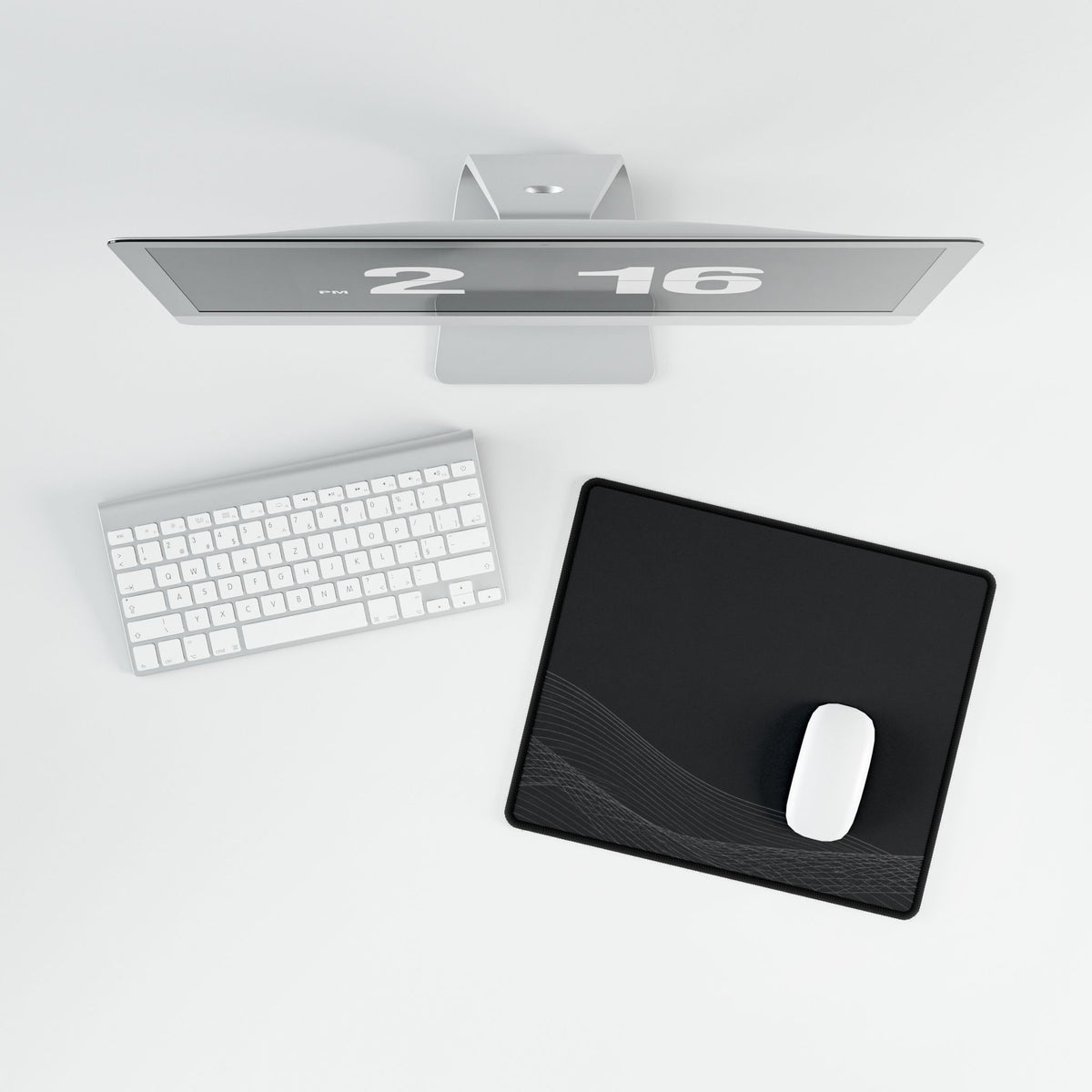 Printify preview: overhead view of Graphite Interference, 14.4 × 12.1 inches, with a mouse beside a keyboard.