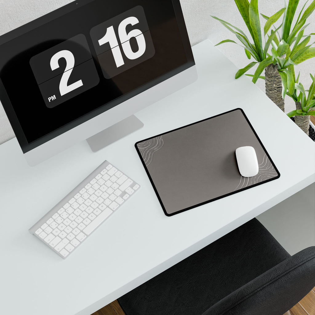Minimal Stone Grey compact desk mat with a mouse beside a white keyboard, viewed at an angle.
