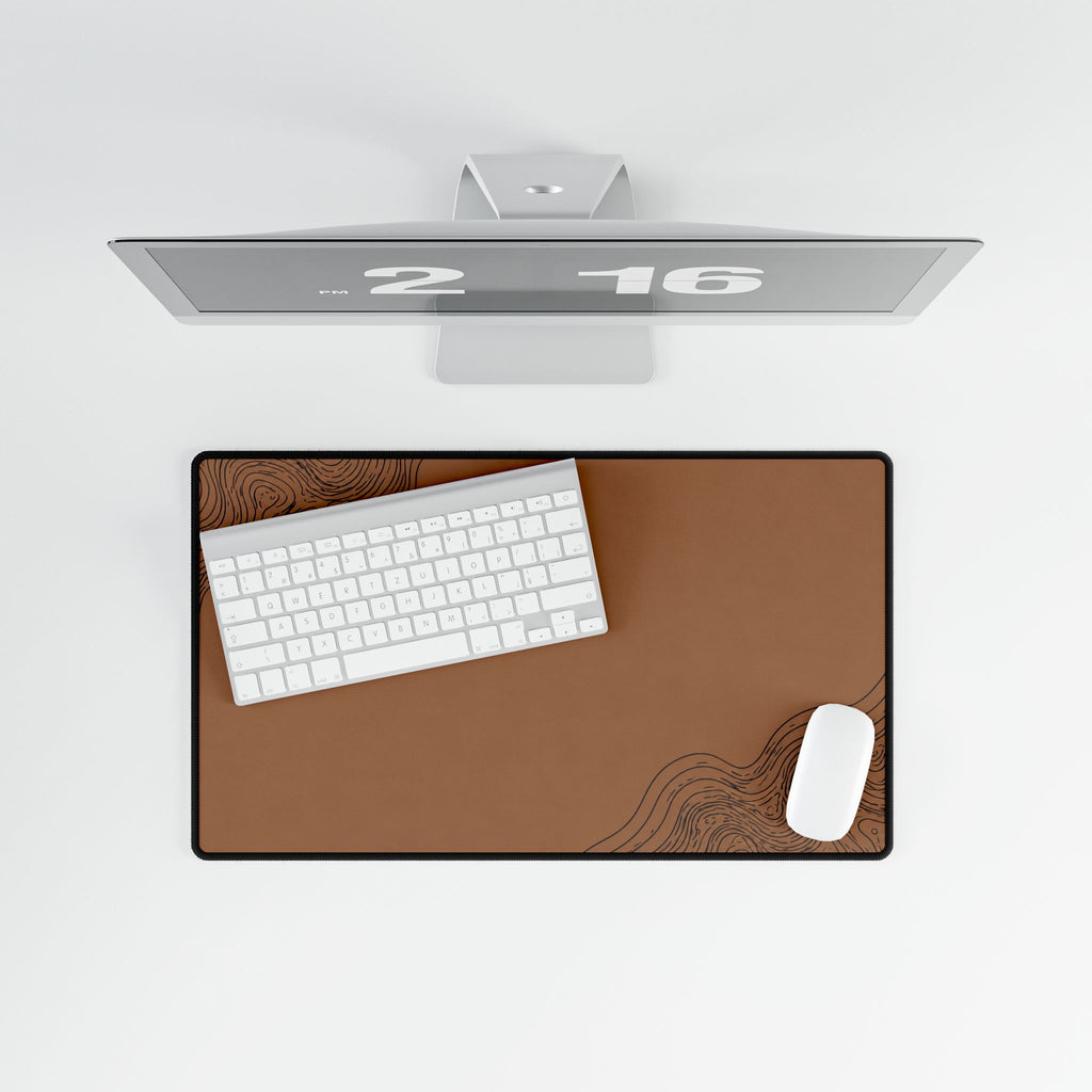Printify preview: Minimal Cognac Ink, 23.6 × 13.8 inches, overhead desk view with keyboard and mouse.