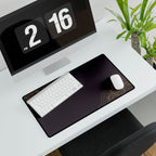 Printify preview: Minimal Aubergine Gold, 23.6 × 13.8 inches, angled desk view with keyboard and mouse.