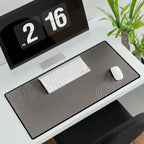 Minimal Stone Grey desk mat in a wide format, shown with a keyboard and mouse on a white desk.