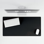 Overhead view of Minimal Black desk mat beneath a keyboard and mouse on a white desk.