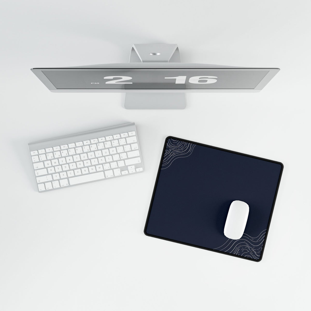 Overhead view of Minimal Navy compact desk mat with a mouse beside the keyboard.