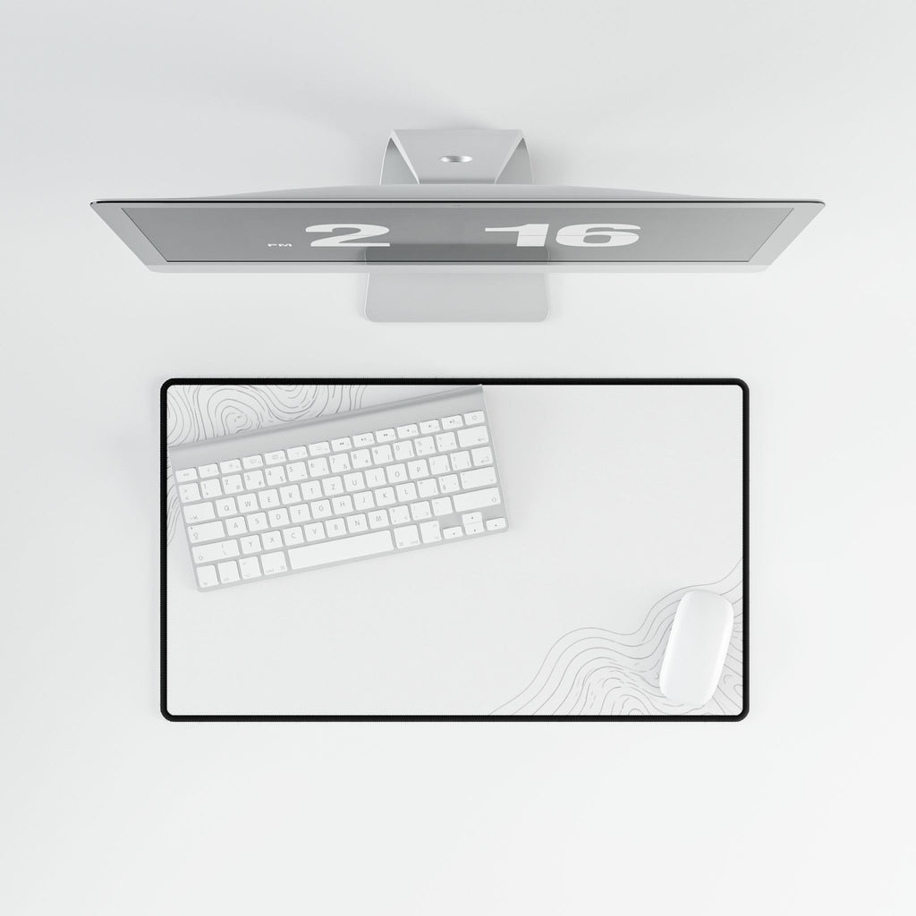Overhead view of Minimal White medium-format desk mat on a white desk.